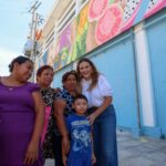 Comerciantes dan vida a mural comunitario